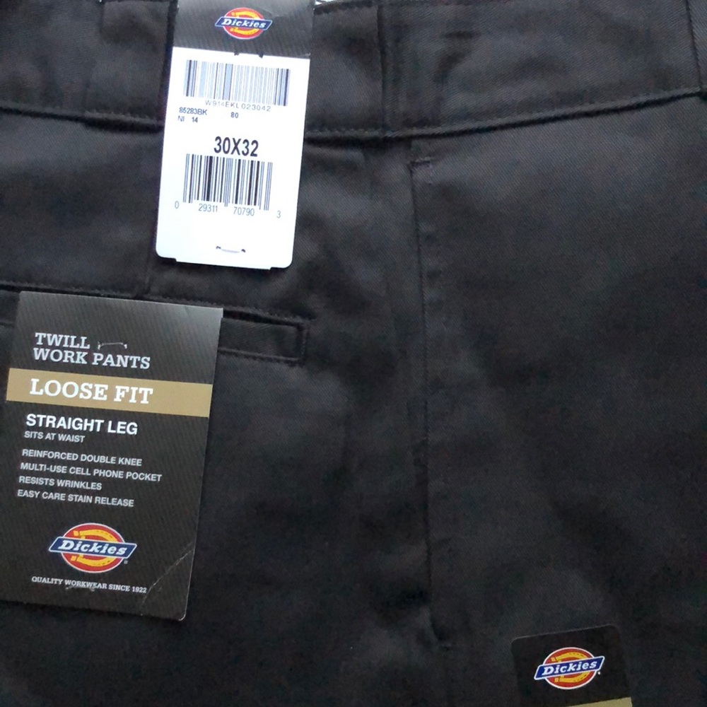 “twill work pants, loose fit, straight leg”